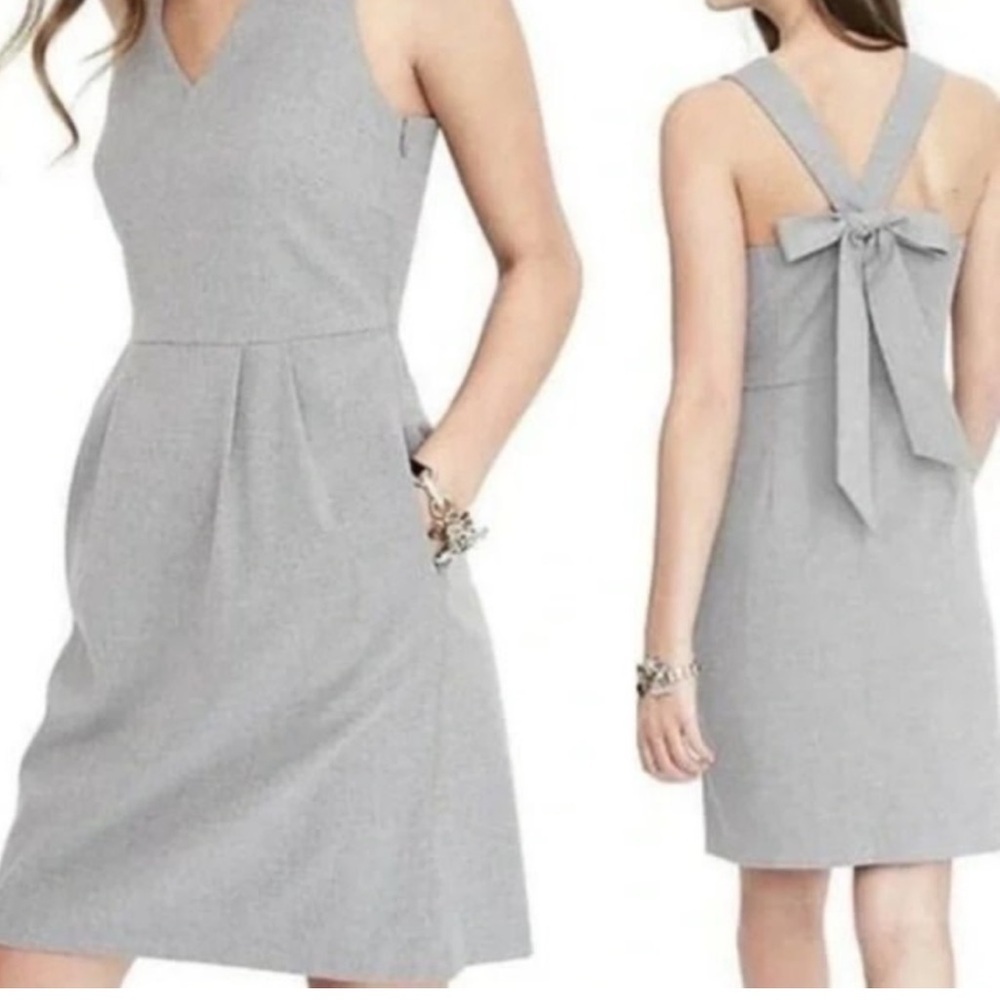 Beautiful dress new. Has pockets and a cute back bow size 4